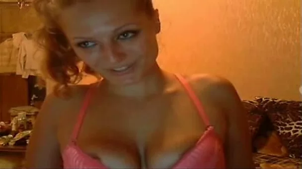 Solo scene with a Russian webcam whore showing her tits and butt