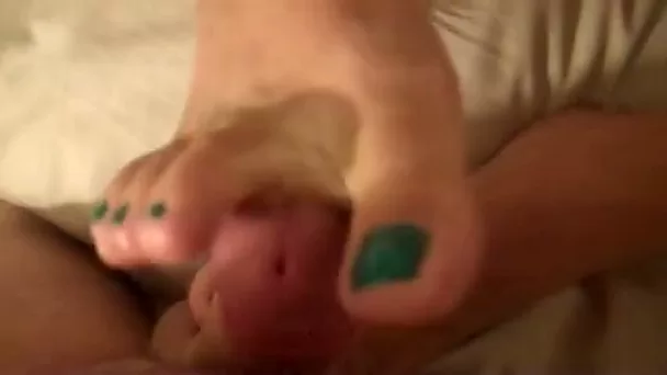 My wife gives me footjob before I fuck her in the puffy pussy