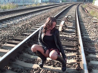 Dirty amateur chick strips and masturbates slit on the rail way