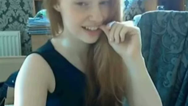 Flirty and cheerful webcam model tickles her pussy with her finger tips