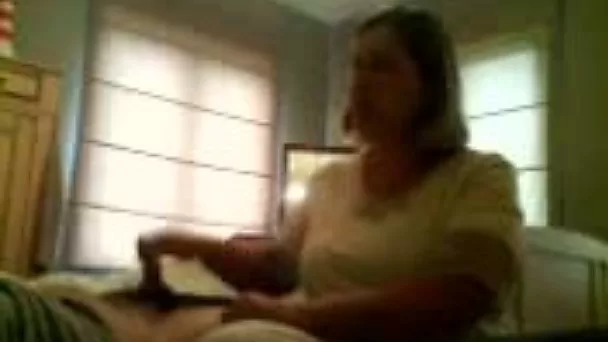 Incredibly spoiled bitch is giving me a quick handjob in front of a camera