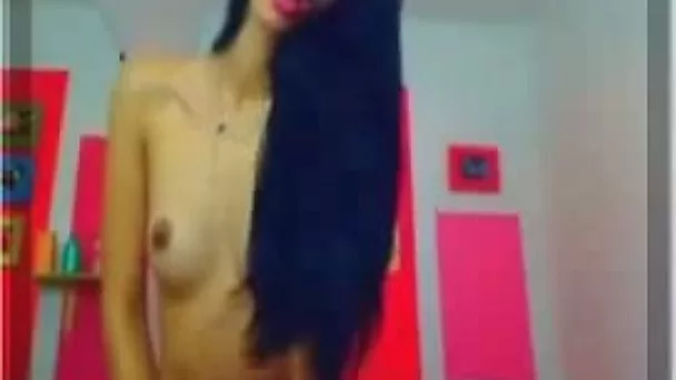 Long haired brunette with a big round butt fucks her anus with her dildo