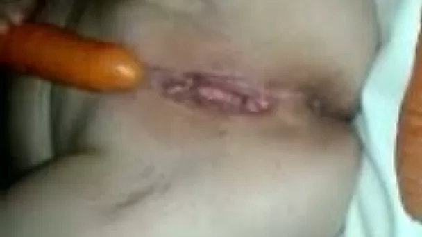 My girlfriend never gets enough of carrots and she loves to fuck on camera