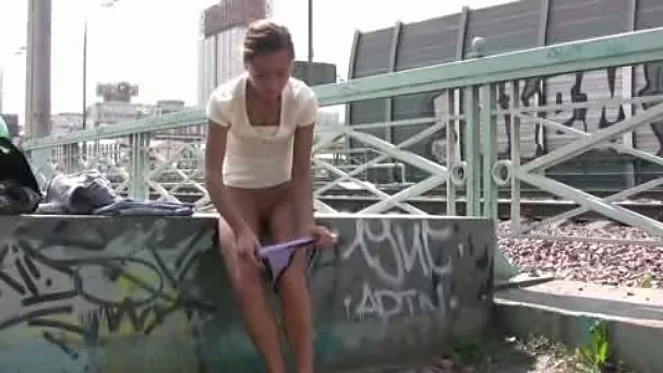 Kristina pees in her tight jeans in a public place