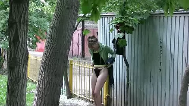 Lewd chick Sveta doesn't mind to pee in the street