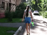Olga soaks her shorts in the street in public pissing solo clip