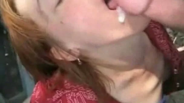Drunk ginger haired girlfriend sucks and takes facial over the car