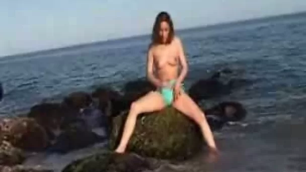 25 years old brunette girlfriend poses her naked body for me on beach