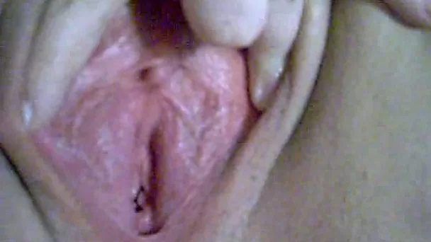 My petite babe finger fucks her pink pussy until it gets creamy