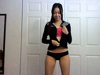Fabulous Asian brunette on webcam stripteasing completely