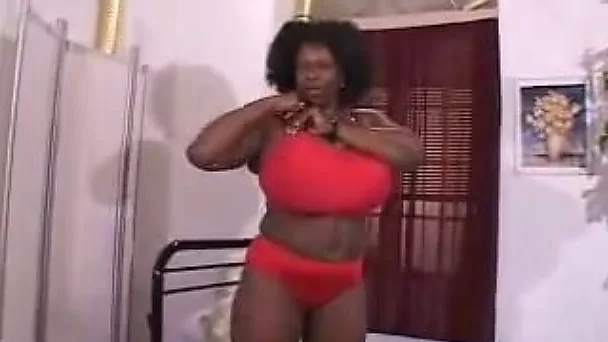 Homemade clip with my ebony wife playing with her enormous tits