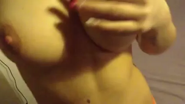 My lover shows her awesome tits to me and plays with my black dick