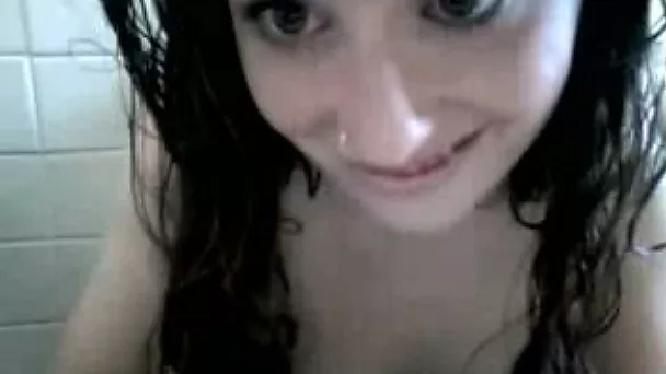 Dark-haired camwhore with perky tits strips for me in the bathroom
