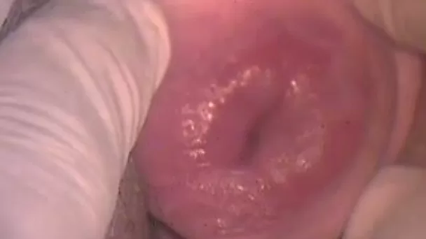 Trashy hoochie lets her lover examine her swollen pussy