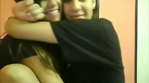 Webcam video with two beautiful girls making out passionately
