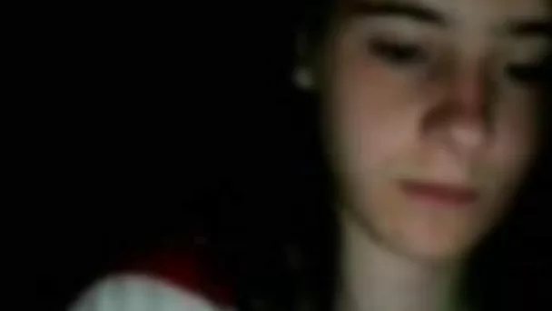 Webcam solo with a brunette teen exposing her natural boobs