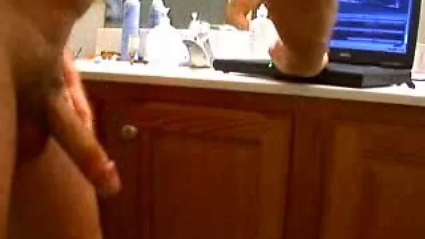 Check out how a jizz all over the place after jerking off my long dick