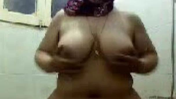 BBW Arabian MILF plays with her big saggy tits on webcam