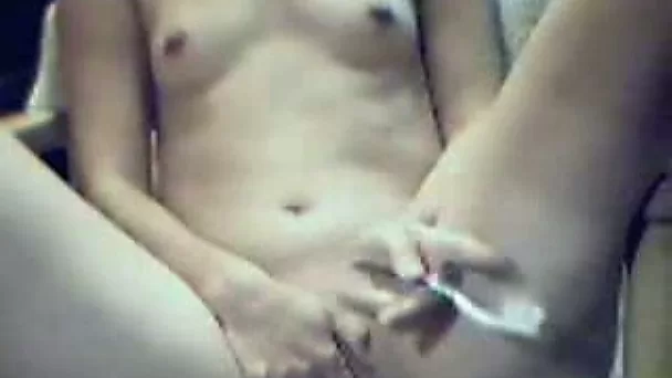 Creative webcam chick masturbates with her bf's tooth brush