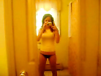 My young curly haired babe self tapes her masturbation solo in bathroom