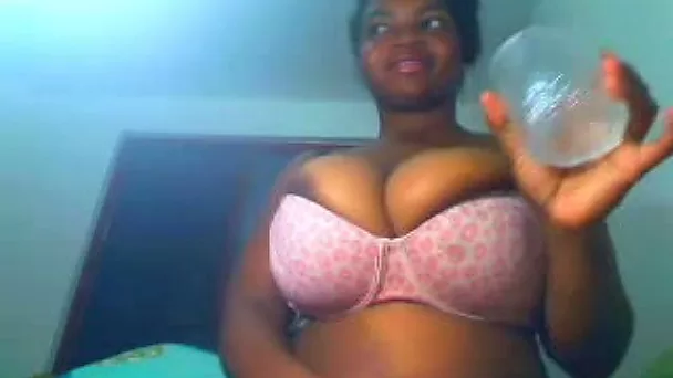 Her pink big bra can barely hold the weight of her enormous titties