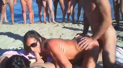 naked beach swingers orgy - Amateur swingers on the nudist beach having groupsex