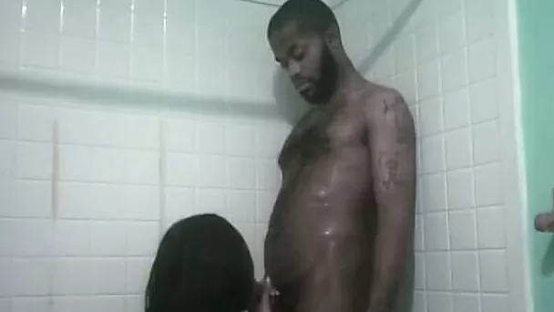 Homemade video with ebony hottie sucking her BF's cock in the shower