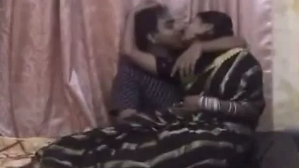 Indian nympho lets her lover caress her tits and then goes down on him