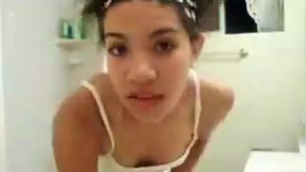 Small tittied Latina hoe is stripping and dancing seductively