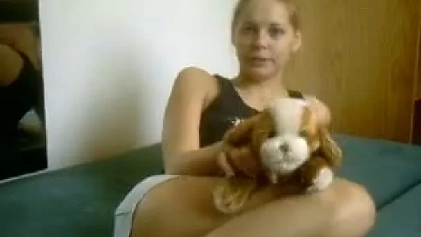 Brown-haired teen rubs her shaved pussy with her fave toy