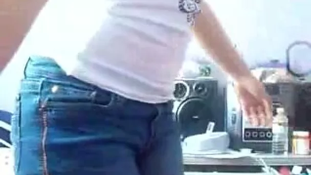 Amateur teen strips and twerks in front of a webcam