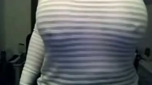 Webcam solo with a juggy brunette milf showing her boobs