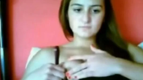 Webcam solo with a lovely European teen kneading her nipples