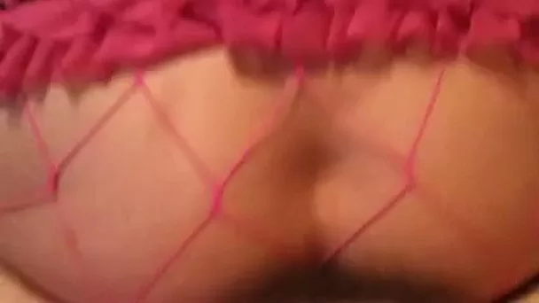 Skanky chick in fishnet stockings likes getting pounded from behind
