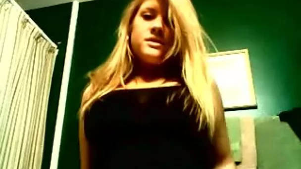 Watch this blonde skank playing with her wet pussy