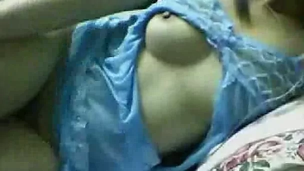 Eye catching Vietnamese webcam MILF pets her hairy pussy with banana