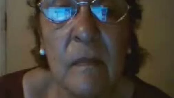 Latina granny in glasses masturbating on webcam for young boys