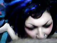 Freaky emo brunette with pierved lips happily sucking dick