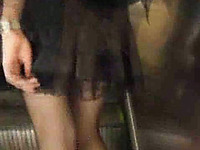 Spying on torrid brunette rocker chick's upskirt - fishnet pantyhose