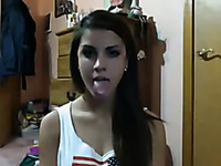 Strikingly beautiful webcam model shows off her long tongue
