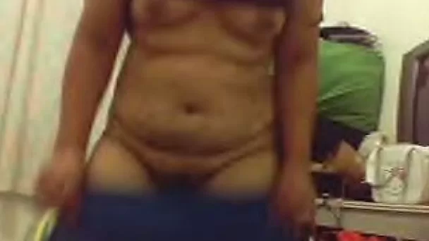 Chubby white slut undresses on webcam to flash her stinky goodies