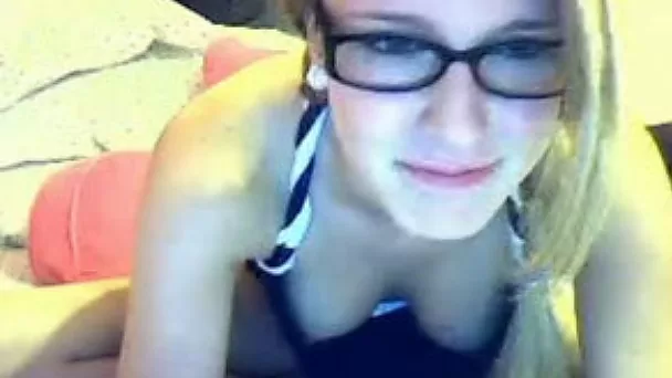 My slender coed flashes her natural tits while we talk in webcam chat