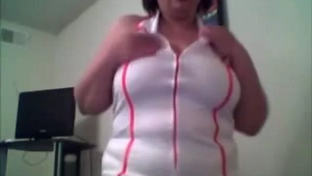 Nerdy and chubby brunette milf toys her cunt in front of a webcam
