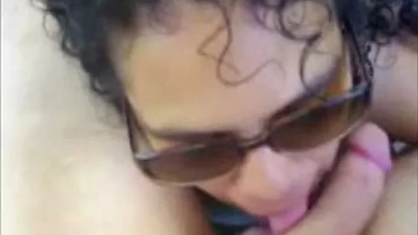 Dirty slender beach girl in sunglasses blows my cock