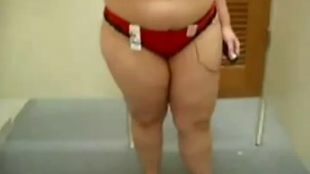 My chubby spouse masturbates her meaty cunt in a dressing room