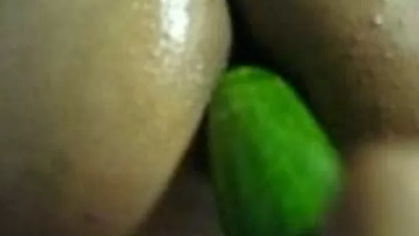 My lover enjoys fucking my pussy with a cucumber in homemade clip