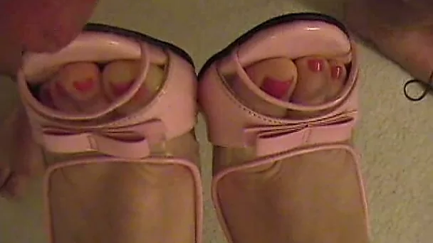 She shows me her toes and feed and I cum on those