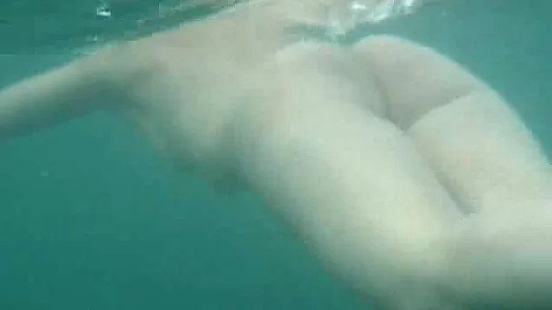 My beautiful wife swims underwater and her butt muscles work