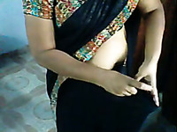 My chubby Indian spouse puts her sari on in homemade clip