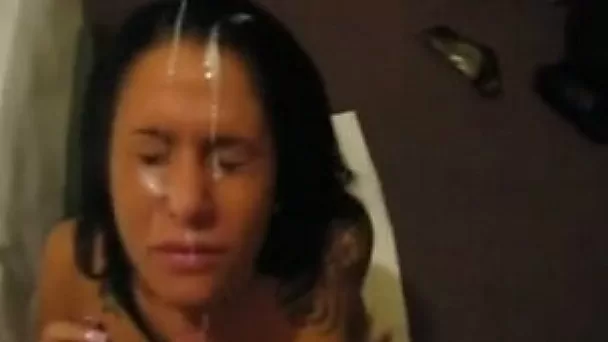 Proudly shows a big sticky facial cum after blowjob